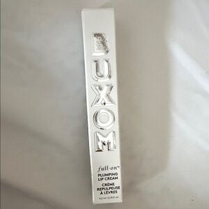 Buxom Full-On Lip Cream in White Packaging